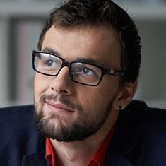 Businessman Thinking Of Idea In Office